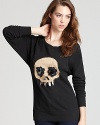 French Connection celebrates the colorful Mexican holiday with this sequined skull adorned sweatshirt.