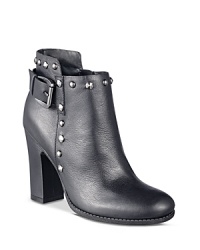 Pair these studded buckle booties from GUESS with a girly skirt or wax-coated jeans for a surprising take on seductive.