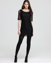 This sublime lace PJK Patterson J. Kincaid dress flaunts the hottest trend of the season in a classic shift silhouette.