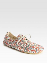 Stretchy canvas go-to in a darling floral print with a lace-up front and rubber sole. Printed cotton canvas upperRubber solePadded insoleMade in ItalyOUR FIT MODEL RECOMMENDS ordering true whole size; ½ sizes should order the next whole size up.