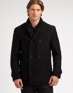 A modern fit, double-breasted peacoat is tailored from superior wool featuring a plaid lining and a ribbed-knit collar for a timeless design that will last throughout this cold-weather season and beyond.Button-frontRibbed-knit collarFully linedAbout 32 from shoulder to hemWoolDry cleanImported