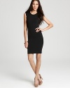 The French Connection little black dress in its most elegant form: sleeveless, form fitting and with a sheer lace cutout at the back.