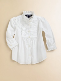 A traditional button-front design in timeless cotton poplin features pintucked detailing and ruffle trim for a girly look.Ruffled stand collarLong sleeves with single-button barrel cuffsButton-frontShirttail hemCottonMachine washImported Please note: Number of buttons may vary depending on size ordered. 