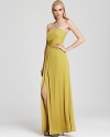 This vividly hued BCBGMAXAZRIA gown features an intricate knot at the waistline, creating gorgeous draping.