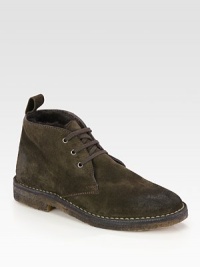 Ultra-soft shearling lines this casual suede favorite, with contrast stitching and a rubber sole for added traction. Rubber heel, 1 (25mm)Suede upperShearling liningRubber solePadded insoleMade in Italy