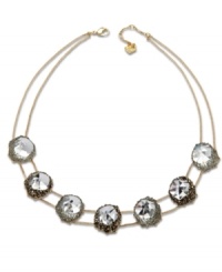 A natural inspiration. Swarovski's innovative gold tone mixed metal statement necklace features seven clear crystals in an exclusive cut. Each one is embellished with small crystals, creating breathtaking light reflections. Approximate length: 16-1/2 inches.