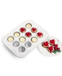 Amaze friends and wow guests with mini cheesecakes and personal cakes cooked to perfection in a 12-slot nonstick pan featuring pop-up bottoms that guarantee effortless removal of treats and impeccable presentation. 10-year warranty.