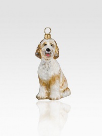 A celebration of Poland's time-honored glassmaking tradition, this charming pup sculpture in glass is lovingly crafted by skilled artisans. Handpainted glass Each ornament takes 7-10 days to complete Arrives in gift box ideal for giving or storing 2W X 3½H X 2D Handmade in Poland 