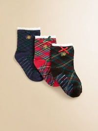 Festive plaid socks keep tiny feet comfy and cozy.Non-skid bottoms58% cotton/22% polyester/18% nylon/1% rubber/1% spandexMachine washImported