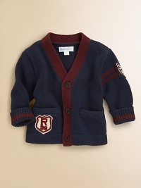 An essential V-neck cardigan in soft flat-knit cotton is accented with stripes and varsity-inspired details for a collegiate look.V-neckLong sleevesButton-frontHand welt pocketsRibbed cuffs and hemCottonMachine washImported Please note: Number of buttons may vary depending on size ordered. 