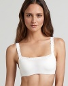 This double lined camisole bra with contour cups and lace trim is meant to be seen. Looks great layered under your favorite low-cut top. Style #134001