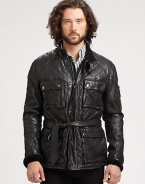 Inspired by a vintage motorcycle jacket, the Jennings Bike Jacket is crafted from supple quilted leather and receives modern updates with a belted waist, reinforced elbow patches and ample utility pockets for storage.Zip frontStand collarChest, waist flap pocketsZippered pocket at sleeveBelted waistFully linedAbout 30 from shoulder to hemLeatherDry cleanImported