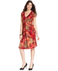 Add a bright splash of color to your wardrobe with Cha Cha Vente's printed V-neck dress.