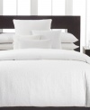 Clean and simple. Crafted of ultra-soft 300-thread count combed cotton percale, these pillowcases from Calvin Klein are the perfect complement to the Mykonos bedding collection.