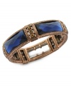 Cutting-edge craftwork. The Montana stretch bracelet from 2028 features ornate tones crafted from copper-tone mixed metal and features wide blue stones for a colorful pop. Approximate length: 7 inches. Approximate height: 1/2 inch.