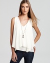 Rendered in crisp, double-layered silk georgette, this airy-light Theory top lends a chic, ethereal look to denim.