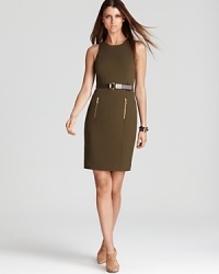 Master utilitarian chic in this belted MICHAEL Michael Kors sheath dress, finished with front zips for modern edge. Amp up the sleek silhouette with nude heels.