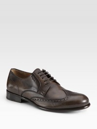 Oxford perforations define this classic style crafted in smooth Italian calfskin leather.Leather upperLeather liningPadded insoleLeather soleMade in Italy