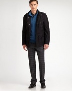 An outerwear essential for the approaching cold weather days, structured in a superior wool blend with a zip and button placket and front pockets for maximum versatility.Zip frontStand collarZippered chest, waist flap pocketsShoulder epaulettesFully linedAbout 30 from shoulder to hem80% virgin wool/20% polyamideDry cleanImported