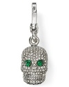 Pretty with a punk side. This Juicy Couture charm flaunts a macabre vibe, bedecked in crystals.