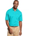 Put in a top performance with this golf shirt from Greg Norman for Tasso Elba featuring PlayDry® technology for comfort.