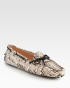 Handcrafted in Italy, this casual favorite takes on exotic appeal in genuine python. Python with lace detailLeather liningRubber solePadded insoleMade in Italy