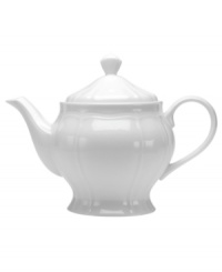 The perfect size for afternoon tea or small gatherings, this gracefully shaped teapot from Mikasa's Antique White dinnerware and dishes collection has a soft fluid feel and clean, embossed design.