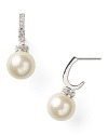 Ease into evening with Carolee's crystal-encrusted pearl drops. With a delicate shape, these earrings add a timeless touch to your favorite cocktail dress and heels.