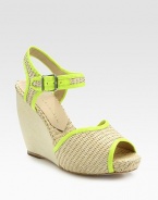 Textured raffia wedge design with an adjustable ankle strap and smooth, contrasting leather trim. Covered wedge, 4 (100mm)Self-covered platform, 1 (25mm)Compares to a 3 heel (75mm)Raffia and leather upperLeather lining and solePadded insoleImportedOUR FIT MODEL RECOMMENDS ordering true size. 