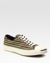 An appealing check pattern adorns this casual classic, rendered in smooth cotton canvas with a durable rubber sole.Cotton canvas upperPadded insoleRubber soleImported