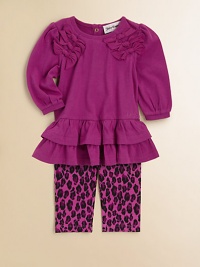 A charming, two-piece set pairs a ruffled, bow-adorned top with matching leopard print leggings. Top CrewneckLong puff sleevesBack snapsRuffled hemLeggings Elastic waistbandHoodie: CottonLeggings: 96% cotton/4% spandexMachine washImported