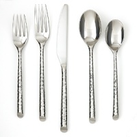 This set includes four each of a dinner fork, dinner spoon, salad fork, teaspoon and dinner knife.