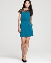 Trend-right lace adds textural contrast to Aqua's color-infused dress, an ultra-flattering choice for dinner or cocktails.