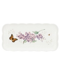 A taste of country living from Lenox. Crafted of elegant white porcelain with a whimsical springtime motif, this Butterfly Meadow Basket tray combines a scalloped edge and textured border for unparalleled charm.