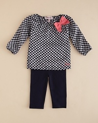 Interlocking hearts create a beguiling pattern on Juicy Couture's adorable bow-trimmed top and cropped legging set.