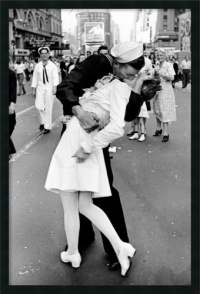 Kissing on VJ Day - Times Square Framed with Gel Coated Finish by Alfred Eisenstaedt Framed