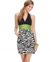 Zebra print amps up this Speechless halter mini dress - perfect for wild times on the town!