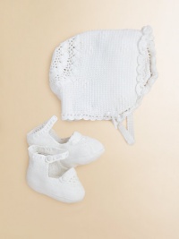 Perfect for a christening or other formal events, our exquisite bonnet-and-bootie set is hand-crocheted from luxuriously soft Pima cotton and finished with timeless heritage details for a precious heirloom look. Bonnet Buttoned chin strapBack panel with double-layered scalloped trim Booties Knit strap fastens over a knit pom-pom ankleSatin ribbon lacingPima cottonHand washImported