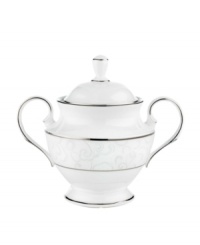 A sweet lace pattern combines with platinum borders to add graceful elegance to your tabletop. The classic shape and pristine white shade make this sugar bowl a timeless addition to any meal. From Lenox's dinnerware and dishes collection.