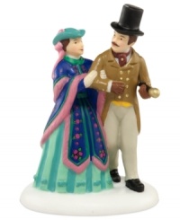 A debonair aristocrat and charming lady walk the streets in Victorian-era England. Crafted of hand-painted porcelain and part of the Dickens' Village collection from Department 56.