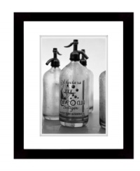 Fitting for the kitchen or bar, this retro-cool wall art depicts vintage seltzer bottles in black and white. Matted and framed in black wood for sophisticated polish from Lauren by Ralph Lauren.