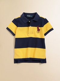 A colorful striped design accents this classic polo shirt in lightweight, knit cotton.Pointed polo collarShort sleevesButton-frontUneven vented hemCottonMachine washImported Please note: Number of buttons may vary depending on size ordered. 