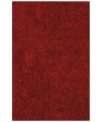 Add a pop of rich, shimmering red to any modern room with the Metallic area rug from Dalyn. Hand-tufted of soft polyester, this high-luster shag area rug puts comfort and fun back in floor decor.