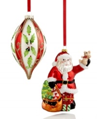 All in the name of cheer. A timeless drop ornament adorned with festive holly and a traditional Santa Claus distributing gifts transform any tree into something truly special.