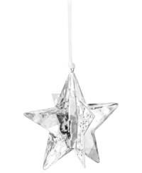 Star bright. The Christmas Moonlight Star ornament brings new brilliance to modern holidays, combining the gleam of Swarovski crystal with goldtone metal and sparkling chatons.