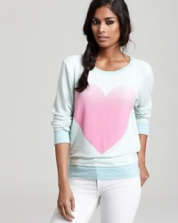 Fall in love with this slouchy-chic WILDFOX sweatshirt, featuring an oversize pink heart.