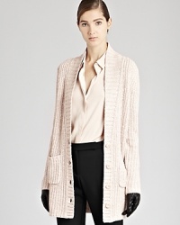 Layer up in luxury with this REISS cardigan in a cozy ribbed knit. Atop office attire or weekend wear, this sweater is a simple yet sophisticated way to add on warmth without sacrificing style.