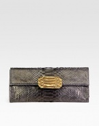 Lustrous python-embossed rubber in a sleek envelope shape.Magnetic flap closureOne inside zip pocketFully lined11¾W X 5¼H X 1½DMade in the USA