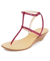 Minimal straps, maximum style. The straps of the Madge wedge sandals by INC International Concepts are covered in jeweled accents, for a look that's as sparkly as it is trendy.