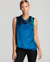 In soft, stretchy silk, Elie Tahari's Ruthie blouse shows off draped and printed details, expertly combined for modern chic.